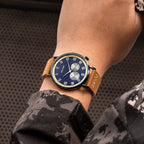MEGIR 1083 men's multifunction watch on the wrist, navy dial with gold-tone ring, black case and tan strap