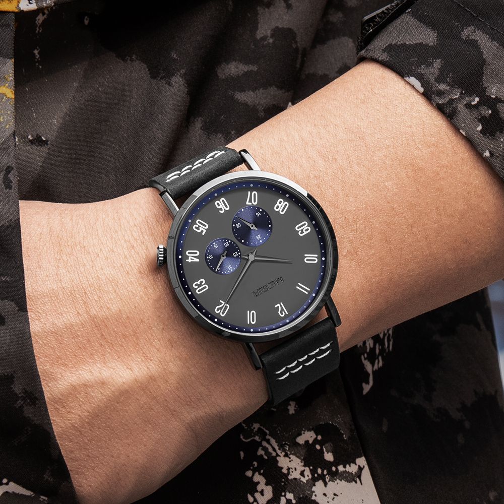 MEGIR 1083 men's multifunction watch on the wrist, grey dial with blue sub-dials, black case and black strap