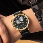 MEGIR 1083 men's multifunction watch on the wrist, black dial, gold-tone case and black leather strap