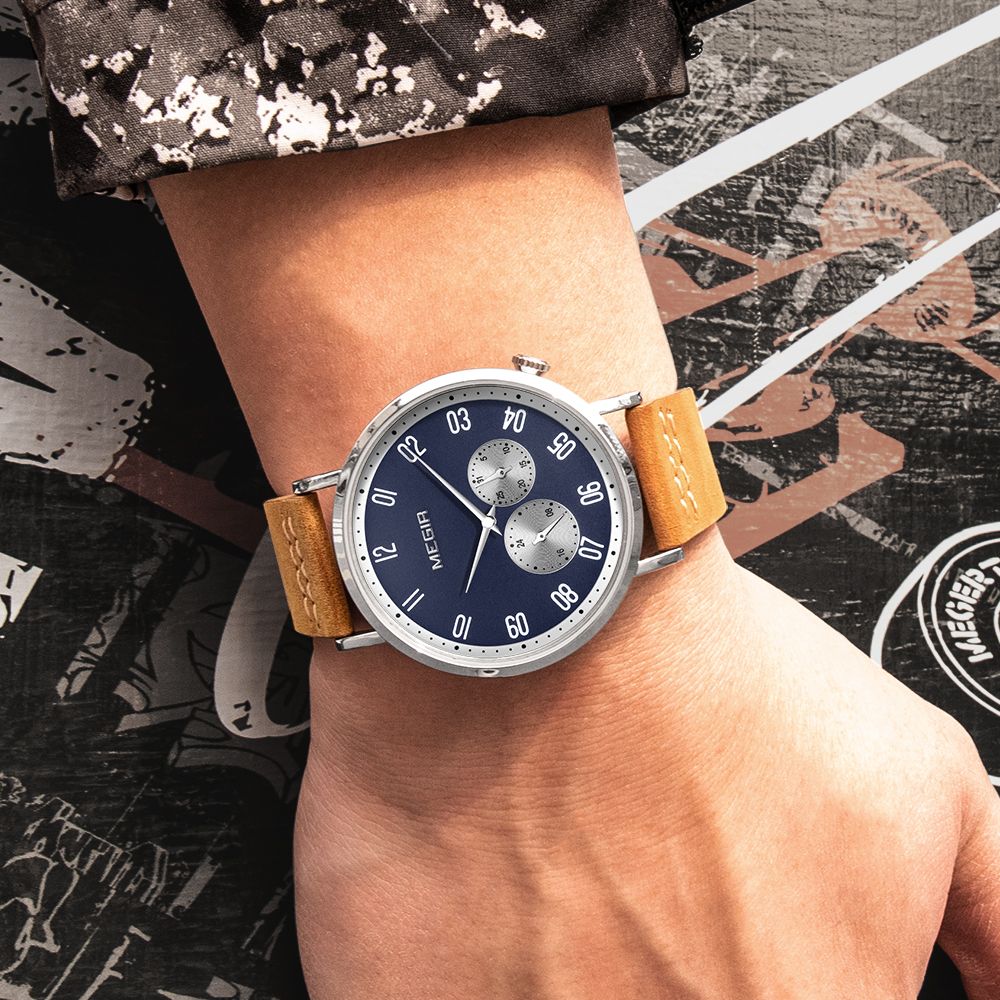 MEGIR 1083 men's multifunction watch on the wrist, navy dial, silver-tone case and brown leather strap