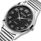 MEGIR 1088 unisex watch, silver-tone case with black Arabic-numeral dial and stretch bracelet, angled view