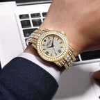 MEGIR 1092 men's iced-out watch on the wrist, gold-tone case and bracelet with crystal-paved dial