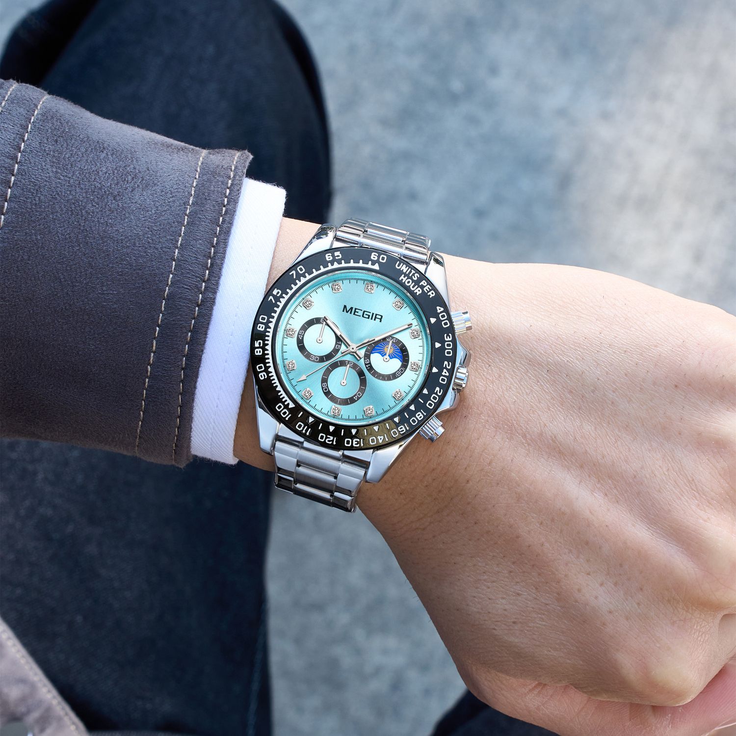 MEGIR 1095 men's multifunction watch on the wrist, turquoise dial with sub-dials and moon phase on a steel bracelet