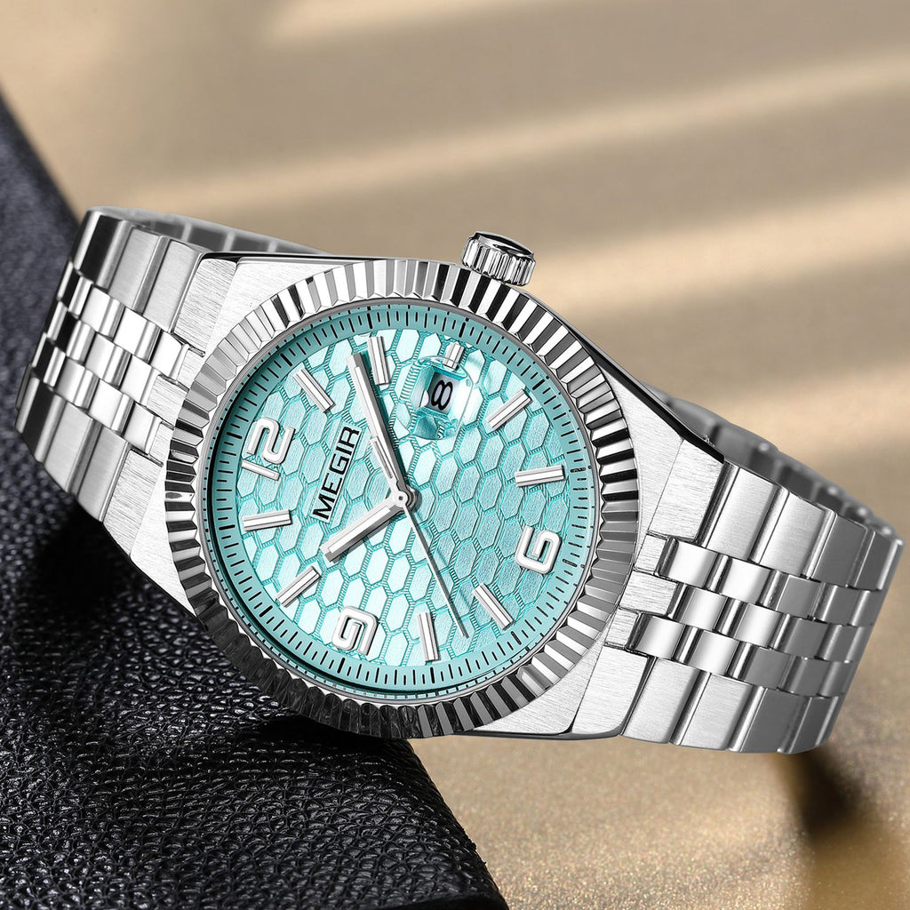 MEGIR 1101 men's dress watch, steel case with turquoise-blue dial, fluted bezel and steel bracelet, angled view