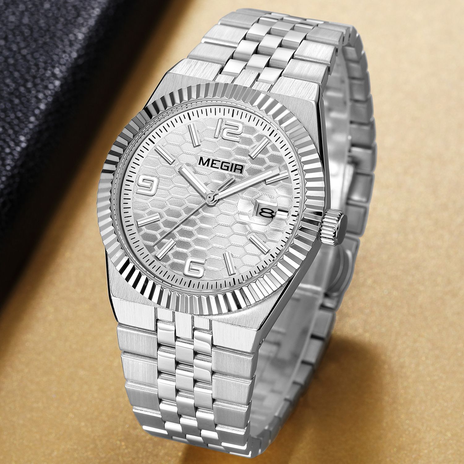 MEGIR 1101 men's dress watch, steel case with silver honeycomb dial, fluted bezel and steel bracelet, angled view