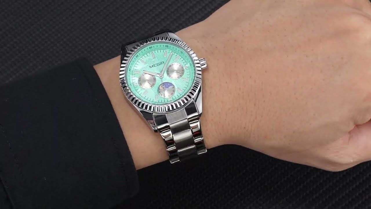 MEGIR 1102 men's multifunction watch product video thumbnail, silver case with turquoise dial on the wrist