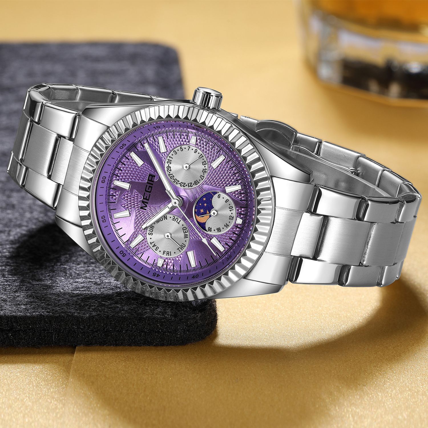 MEGIR 1102 men's multifunction watch, silver case with purple moon-phase dial and steel bracelet, angled view