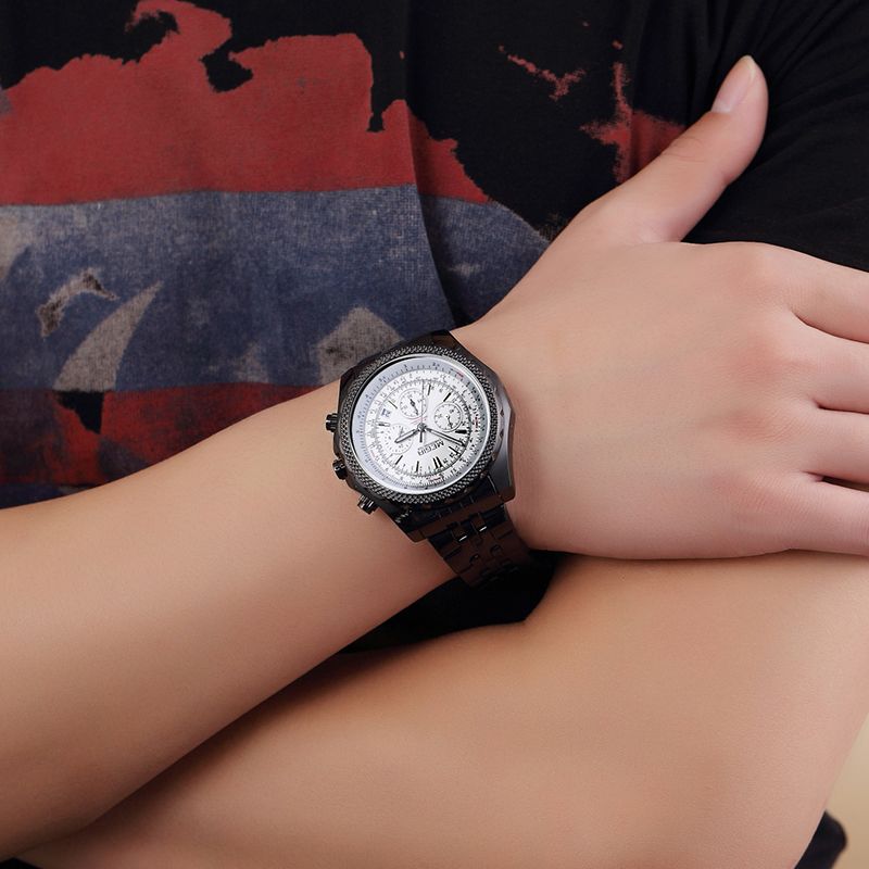MEGIR 2006 men's chronograph watch on the wrist, black case with white dial and black steel bracelet