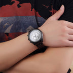 MEGIR 2006 men's chronograph watch on the wrist, black case with white dial and black steel bracelet