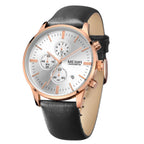 MEGIR 2011 men's chronograph watch, rose-gold case with white dial and black leather strap, angled view