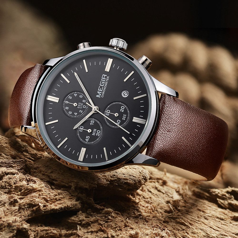 MEGIR 2011 men's chronograph watch, silver case with black dial and brown leather strap, three-quarter view