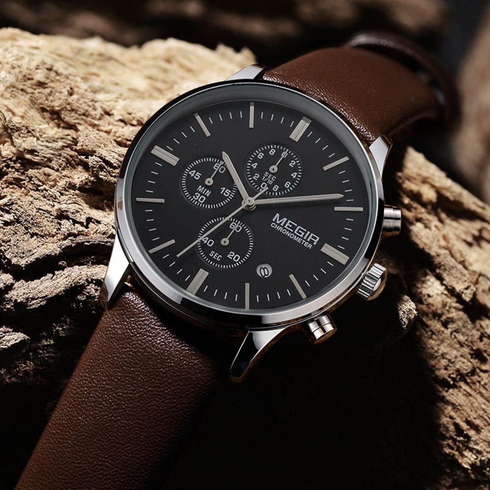 MEGIR 2011 men's chronograph watch, silver case with black dial and brown leather strap, angled view
