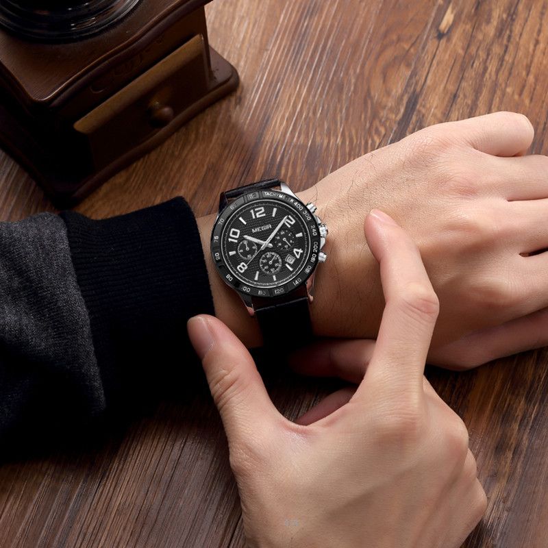 MEGIR 2014 men's chronograph watch on the wrist, silver case with black dial and black leather strap