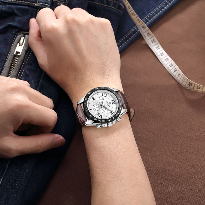 MEGIR 2014 men's chronograph watch on the wrist, silver case with white dial and brown leather strap