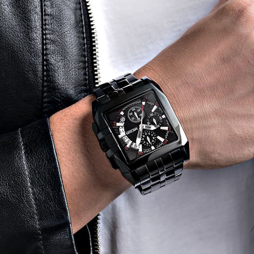 MEGIR 2018 men's chronograph watch on the wrist, all-black rectangular case with black dial and steel bracelet