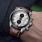 MEGIR 2020 men's chronograph watch on the wrist, silver case with white dial and brown leather strap