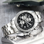 MEGIR 2030 men's chronograph watch, silver case with black dial and stainless steel bracelet, angled view