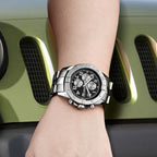 MEGIR 2030 men's chronograph watch on the wrist, silver case with black dial and stainless steel bracelet, close-up
