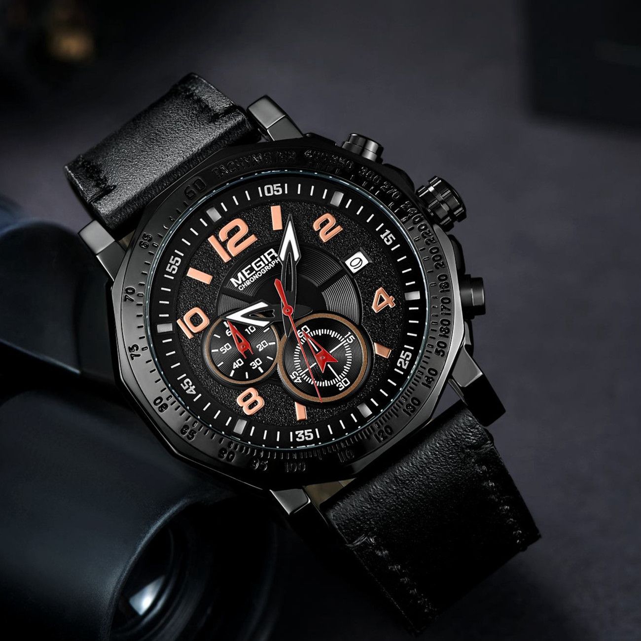 MEGIR 2048 men's chronograph watch, all-black case with black dial and black leather strap, angled view