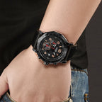 MEGIR 2048 men's chronograph watch on the wrist, all-black case with black dial and black leather strap