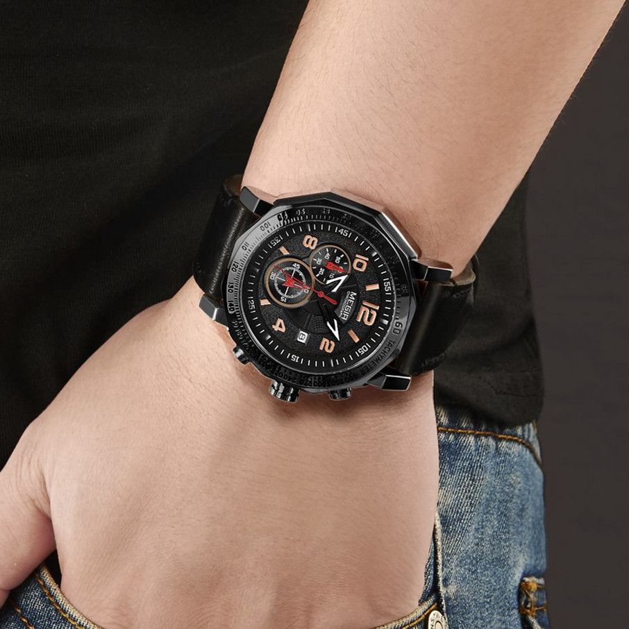 MEGIR 2048 men's chronograph watch on the wrist, all-black case with black dial and black leather strap
