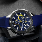 MEGIR 2053 men's chronograph watch, silver case with blue dial and blue silicone strap, angled view