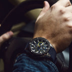 MEGIR 2053 men's chronograph watch on the wrist, silver case with blue dial and blue silicone strap, close-up