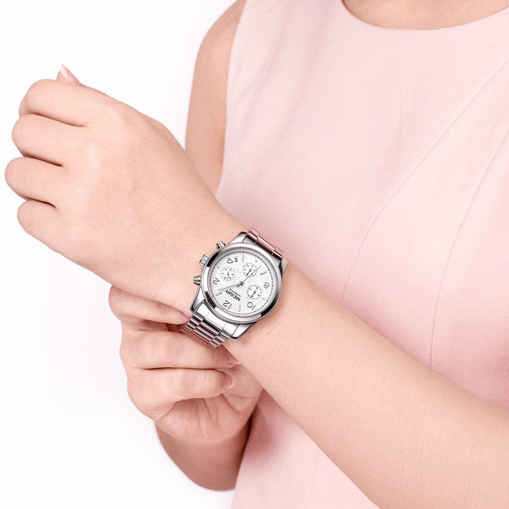 MEGIR 2057 women's chronograph watch on the wrist, silver case with white dial and stainless steel bracelet