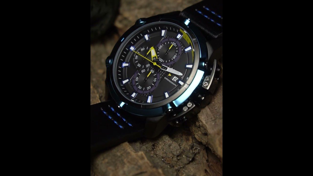 MEGIR 2062 men's chronograph watch product video thumbnail, black case with blue bezel on a wood surface