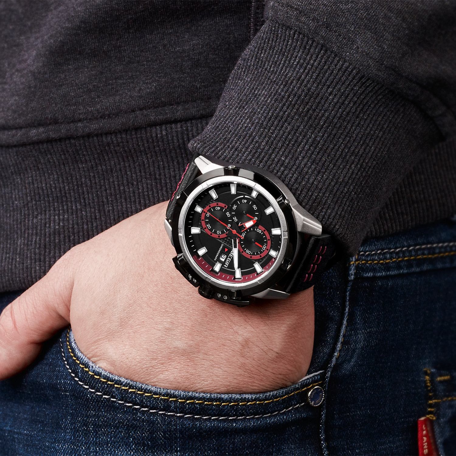 MEGIR 2062 men's chronograph watch on the wrist, silver case with black dial and red accents, close-up