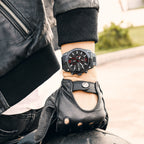 MEGIR 2063 men's chronograph watch on the wrist, all-black case with black dial and black stainless steel bracelet