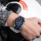 MEGIR 2064 men's chronograph watch on the wrist, rose-gold and blue case with blue dial and blue steel bracelet