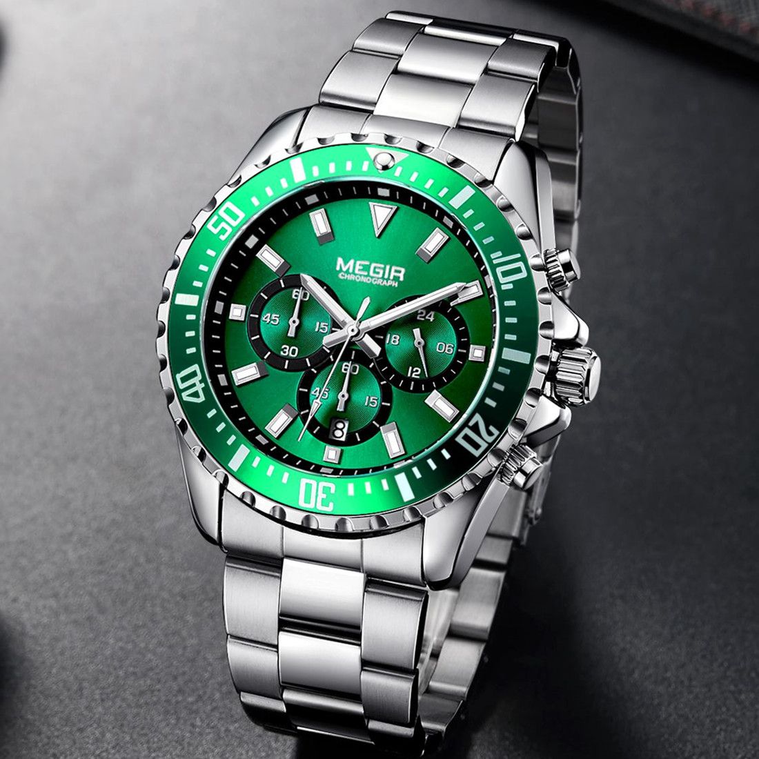 MEGIR 2064 men's chronograph watch, silver case with green dial and stainless steel bracelet, angled view