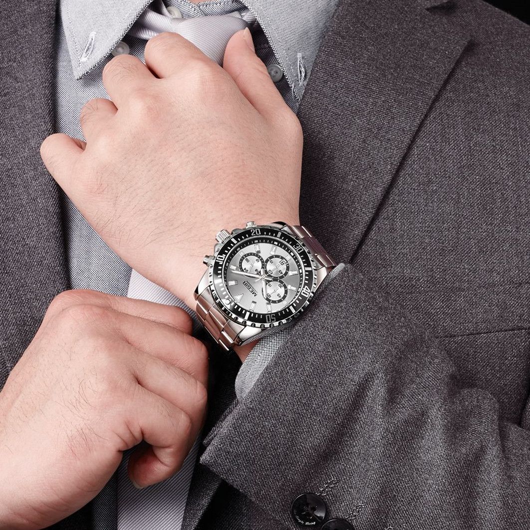 MEGIR 2064 men's chronograph watch on the wrist, silver case with silver dial and stainless steel bracelet