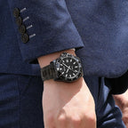MEGIR 2064AG men's dive watch on the wrist, all-black case with black dial and black stainless steel bracelet