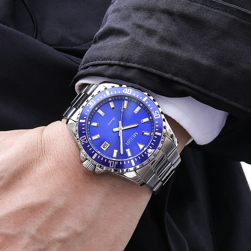MEGIR 2064AG men's dive watch on the wrist, silver case with blue dial and stainless steel bracelet