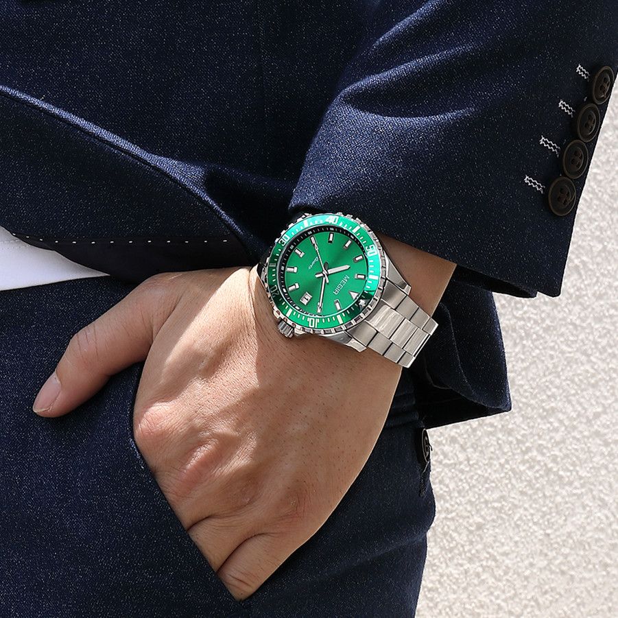 MEGIR 2064AG men's dive watch on the wrist, silver case with green dial and stainless steel bracelet