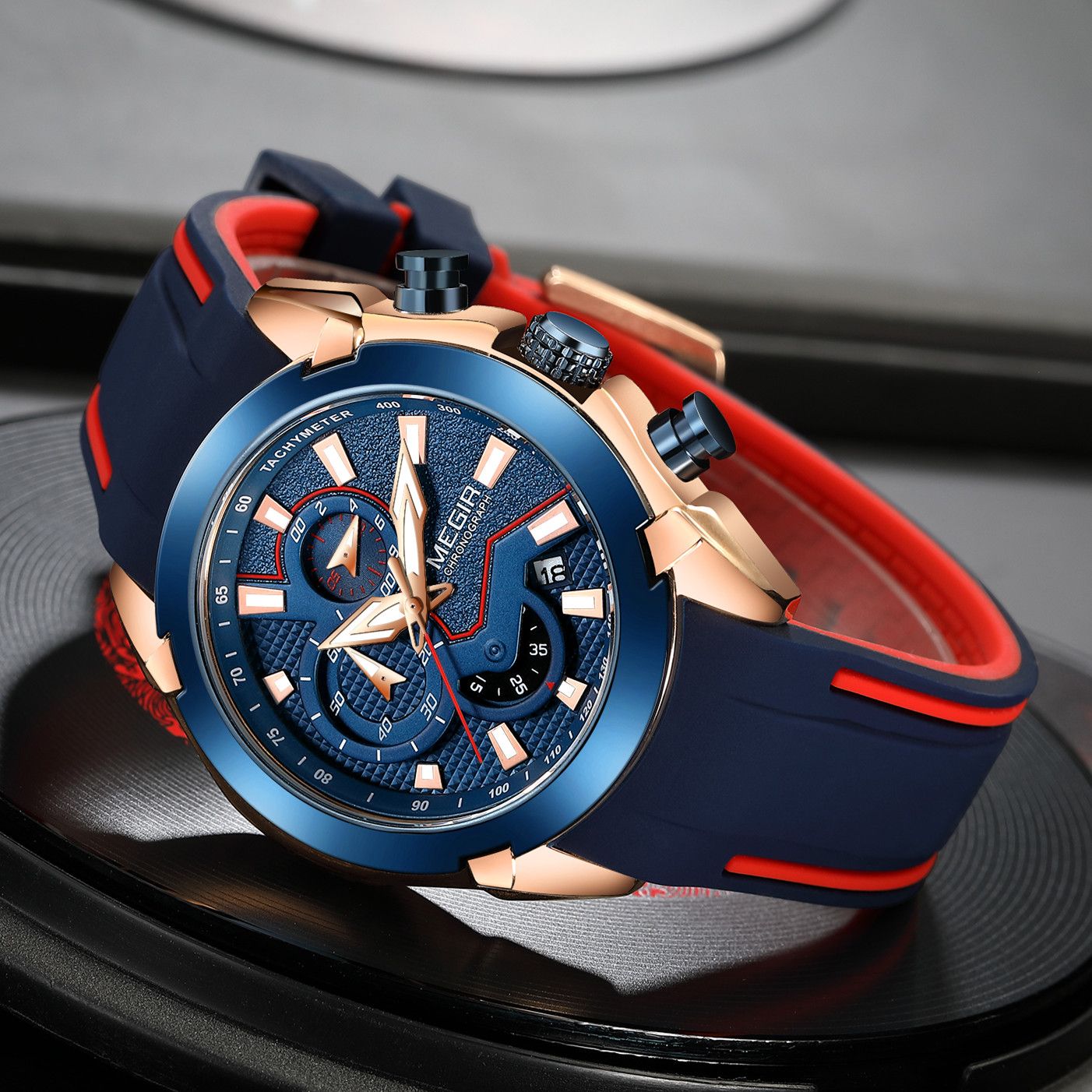 MEGIR 2065 men's chronograph watch, rose-gold and blue case with blue dial and blue silicone strap, angled view