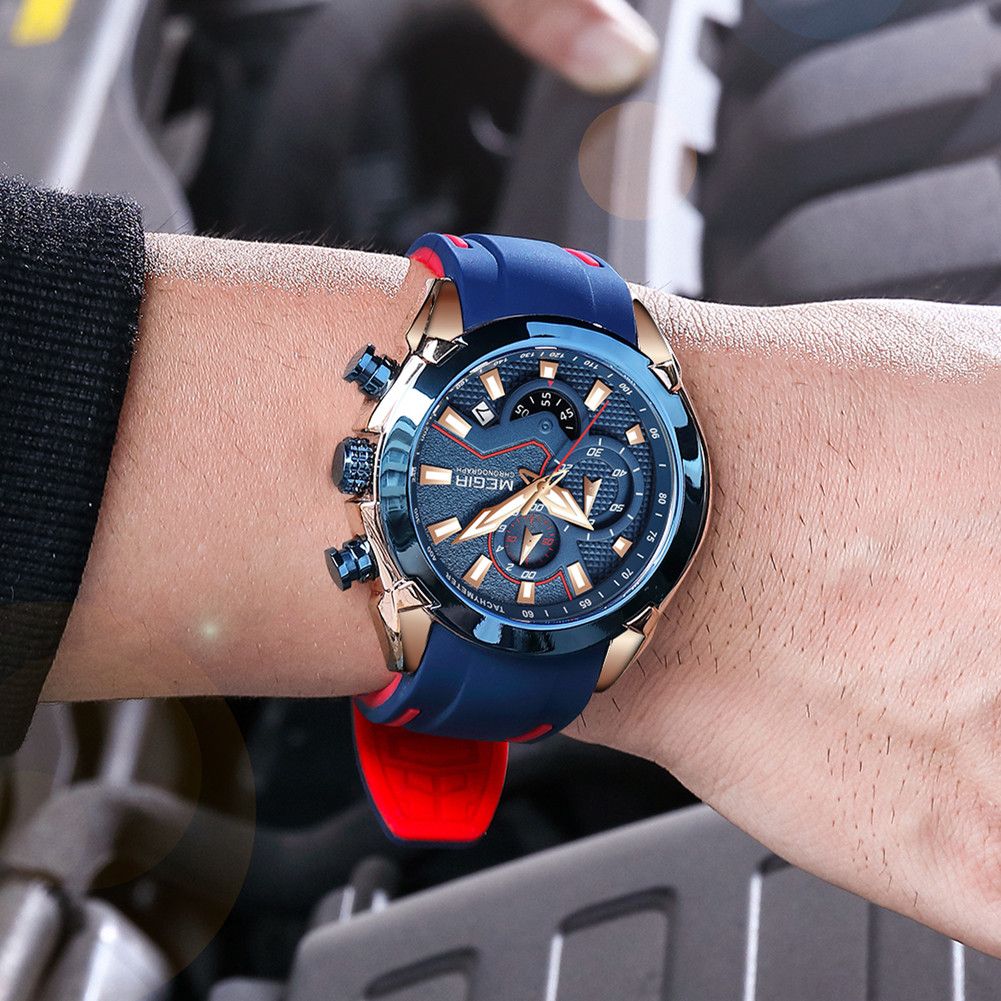MEGIR 2065 men's chronograph watch on the wrist, blue case with blue dial and blue silicone strap, close-up