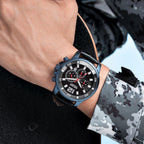 MEGIR 2068 men's chronograph watch on the wrist, blue case with black dial and black leather strap