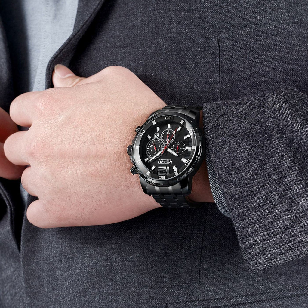 MEGIR 2068 men's chronograph watch on the wrist, black case with black dial and black stainless steel bracelet