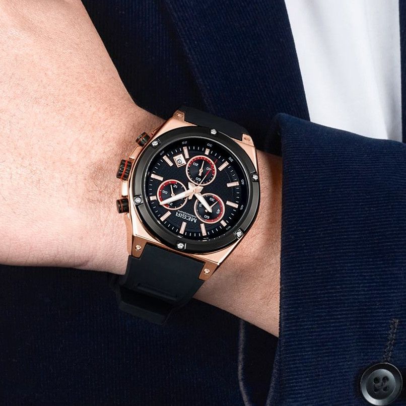MEGIR 2073 men's chronograph watch on the wrist, rose-gold case with black dial and black silicone strap