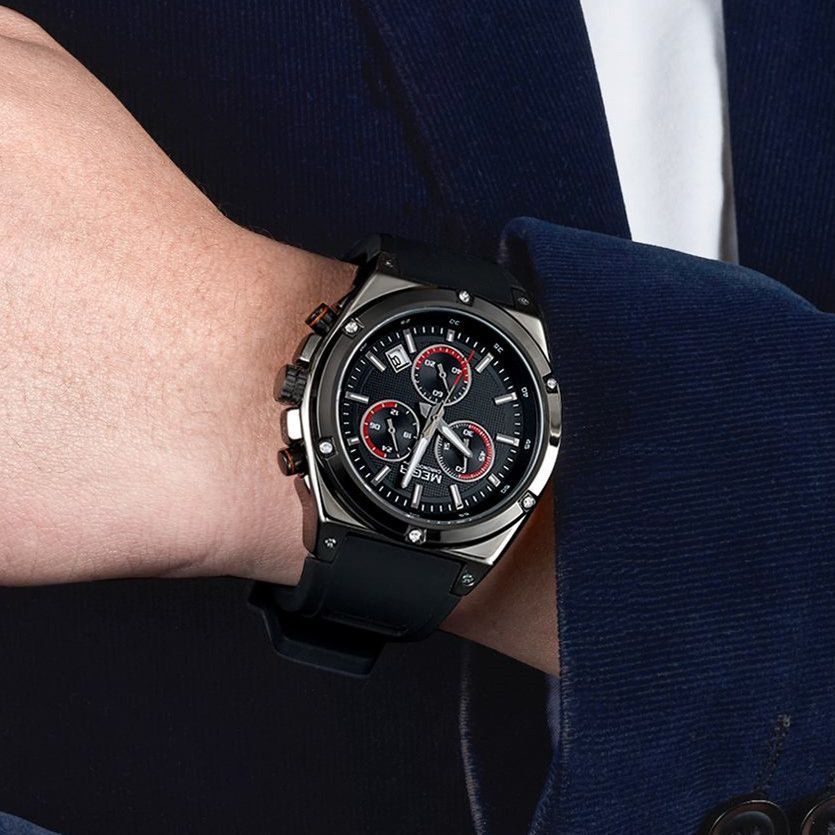 MEGIR 2073 men's chronograph watch on the wrist, silver case with black dial and black silicone strap