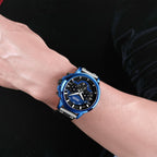 MEGIR 2080 men's chronograph watch on the wrist, blue case with blue and black dial and black leather strap