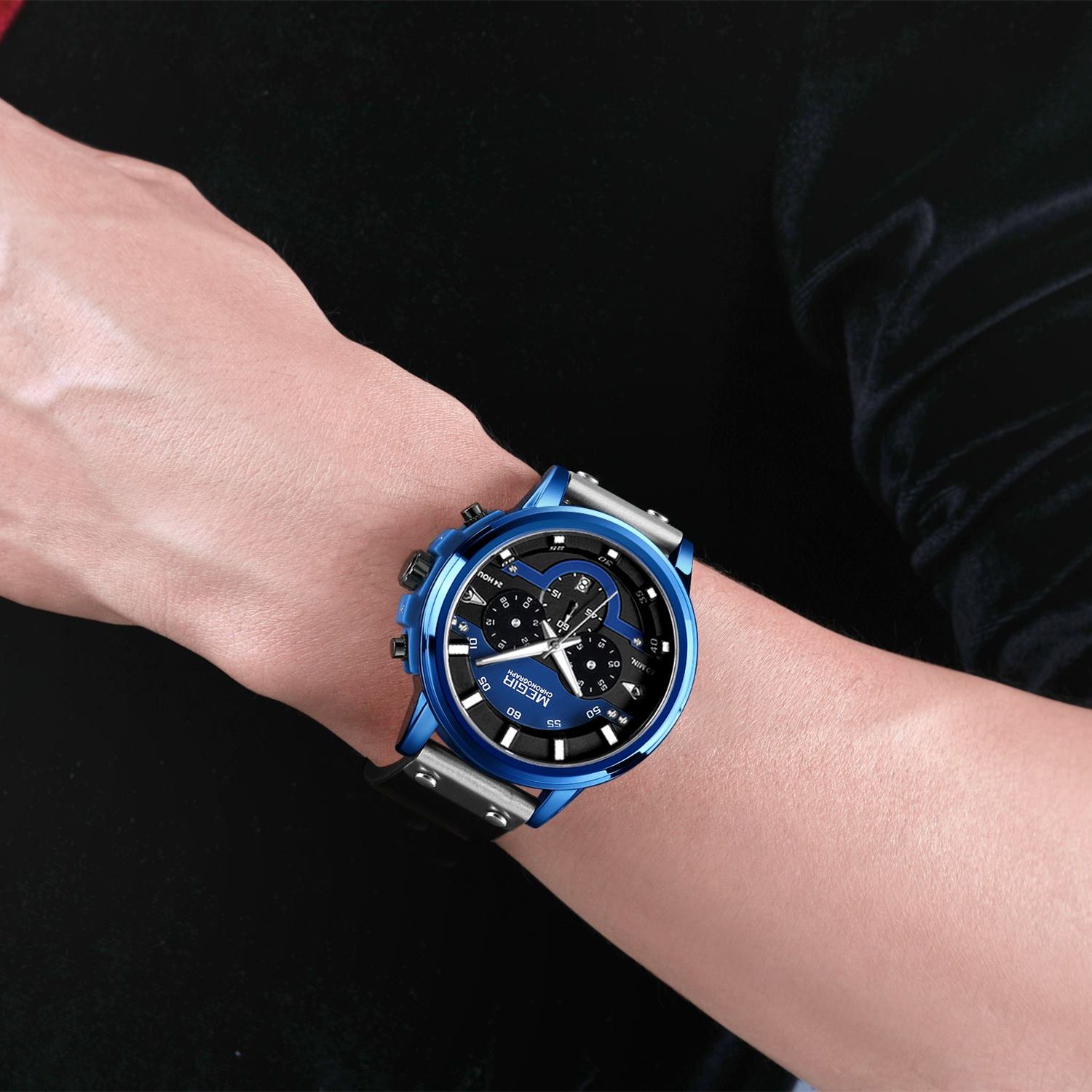 MEGIR 2080 men's chronograph watch on the wrist, blue case with blue and black dial and black leather strap