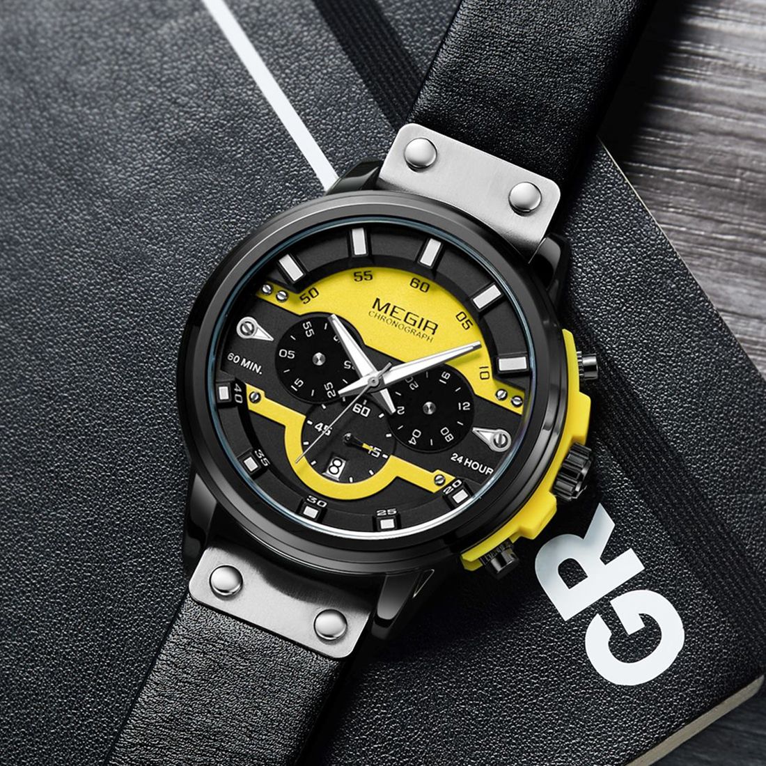 MEGIR 2080 men's chronograph watch, black case with yellow and black dial and black leather strap, angled view