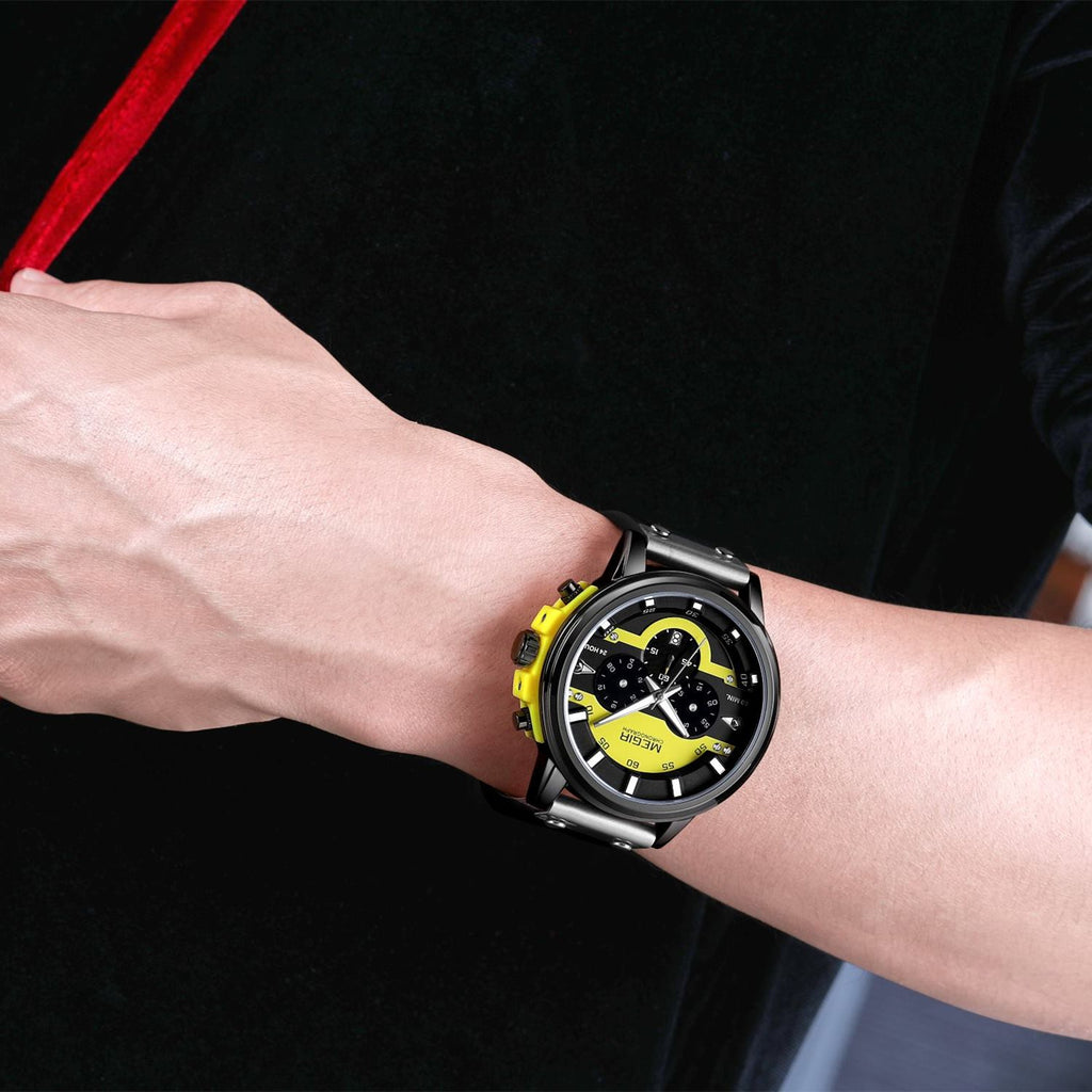 MEGIR 2080 men's chronograph watch on the wrist, black case with yellow and black dial and black leather strap