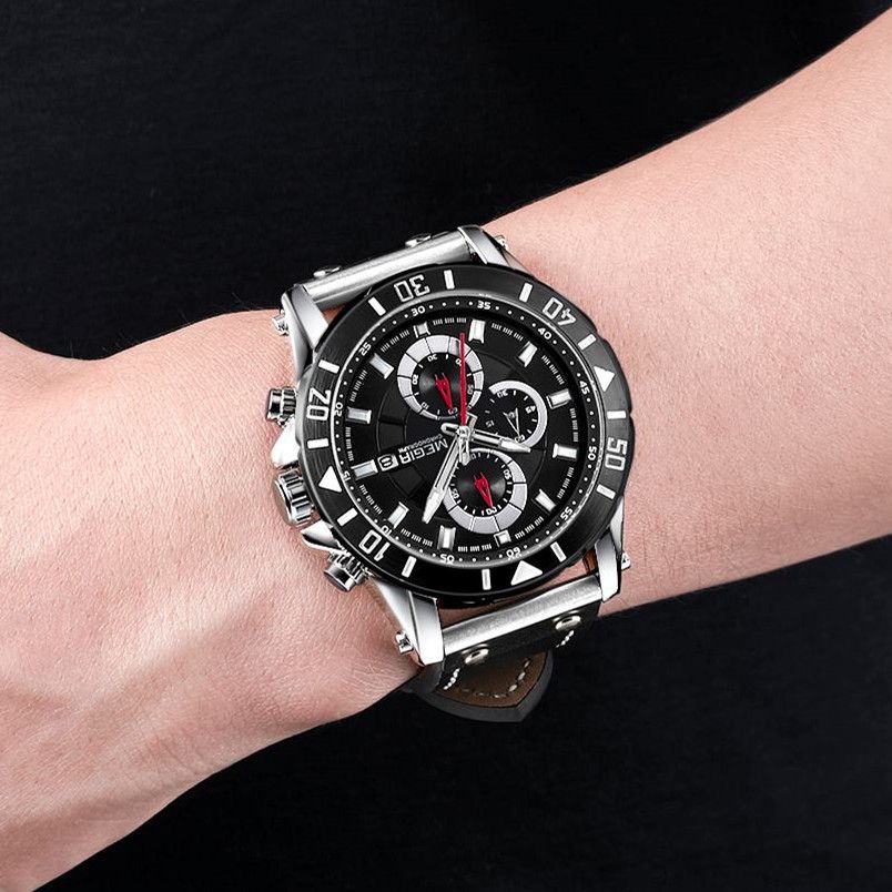 MEGIR 2081 men's chronograph watch on the wrist, silver case with black dial and black leather strap