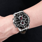 MEGIR 2081 men's chronograph watch on the wrist, silver case with black dial and black leather strap