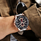 MEGIR 2081 men's chronograph watch on the wrist, rose-gold case with black dial and brown leather strap